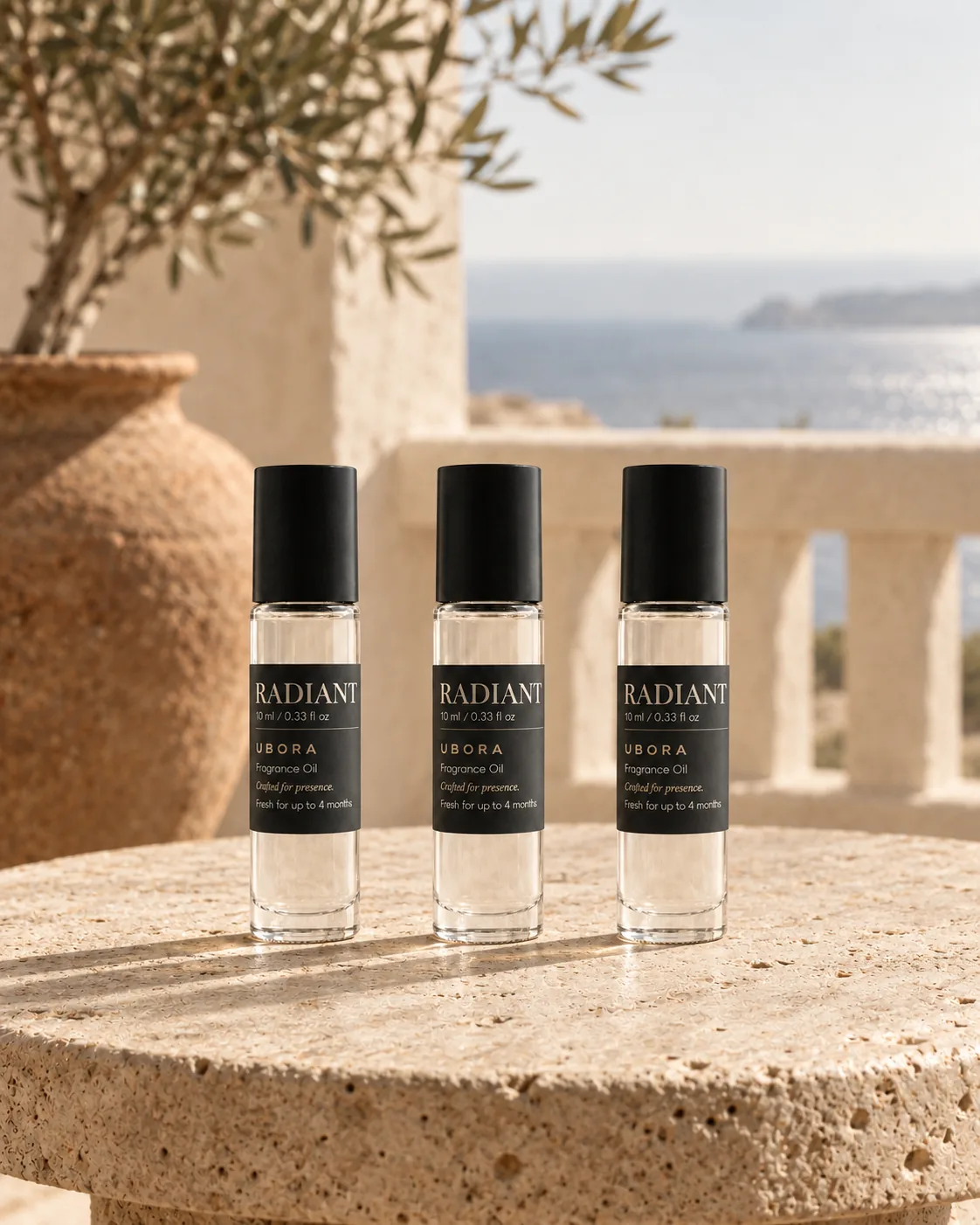 Three bottles of the same UBORA scent