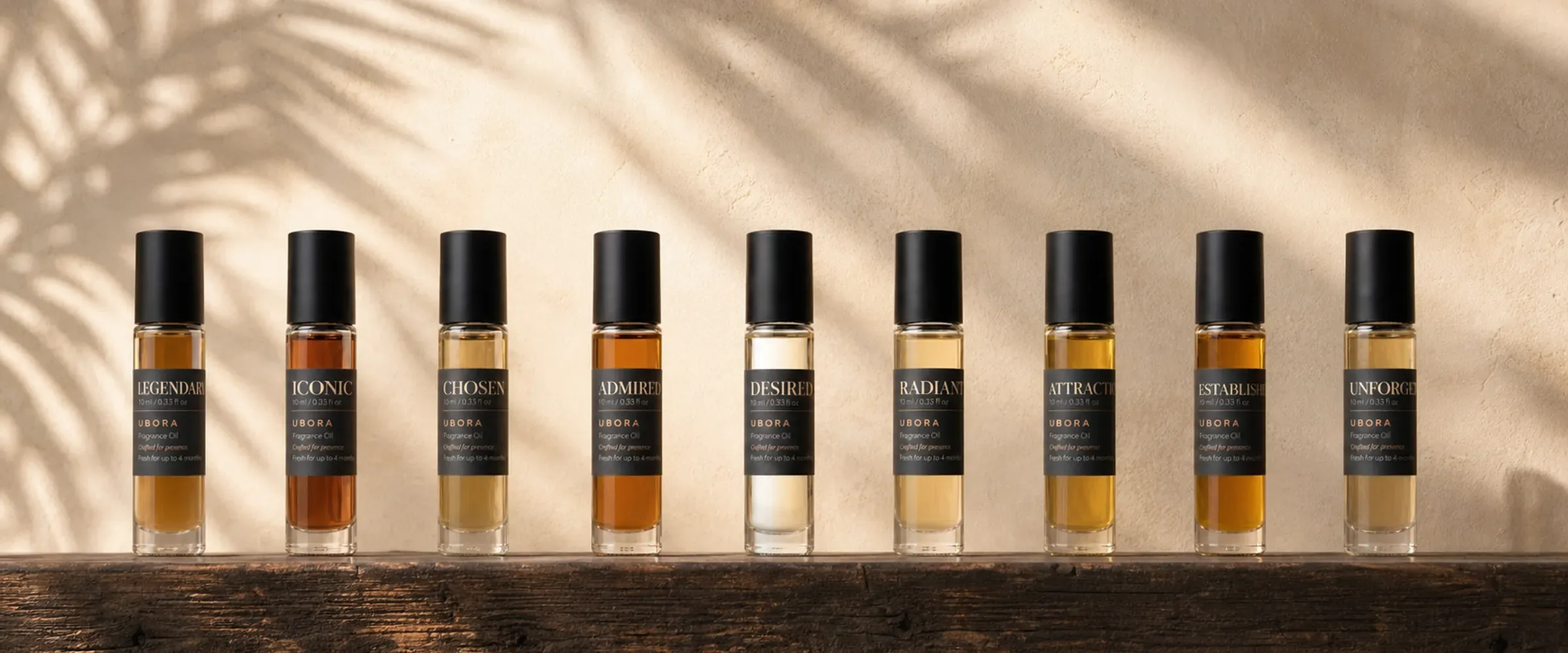 Nine UBORA fragrance oils displayed in a row