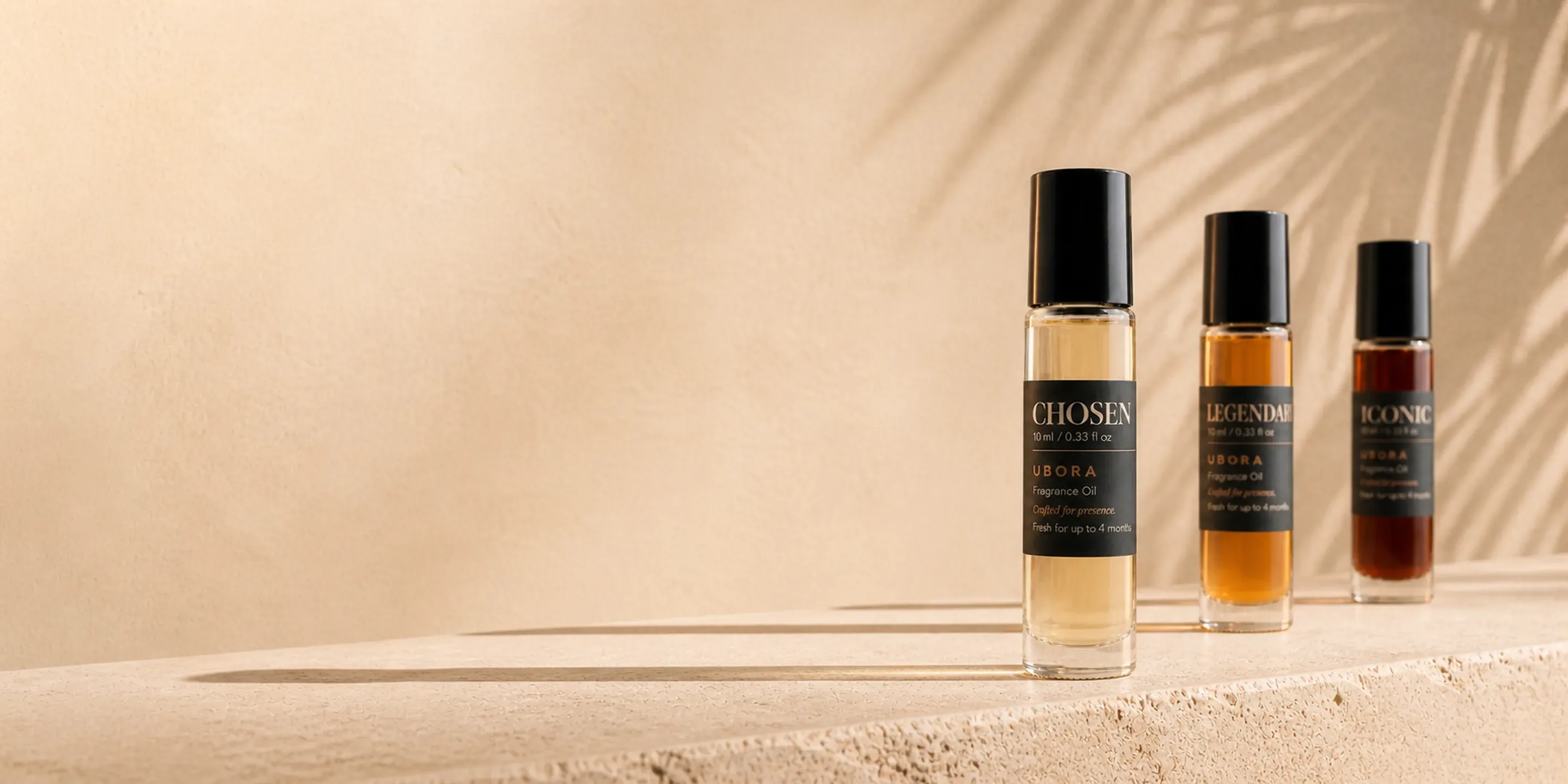 Three UBORA fragrance oils in morning light